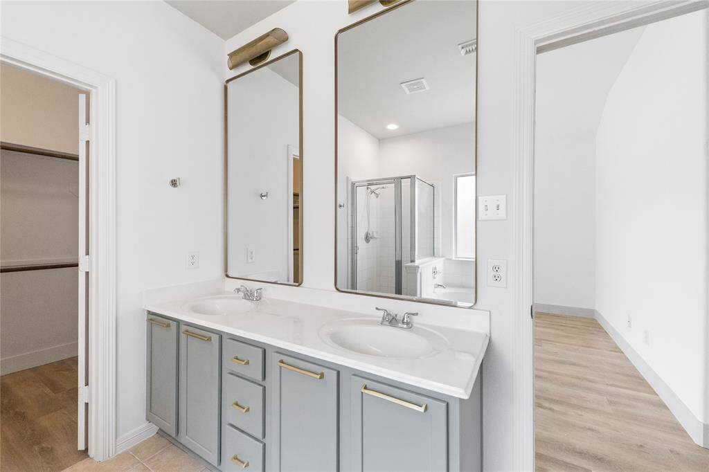 Primary Bathroom, duel sink and oversized mirrors