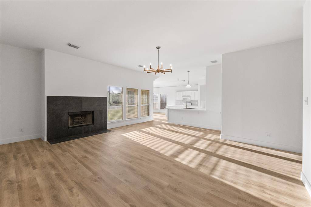 Family Room with large windows for plenty of natural light