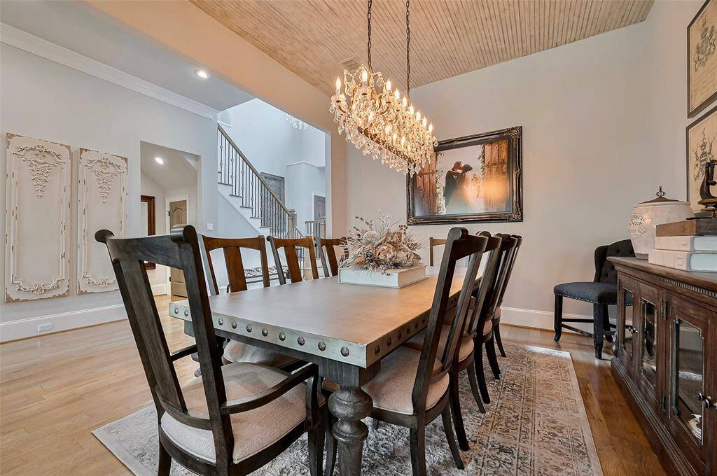 At the center of the dining room a striking Restoration Hardware chandelier anchors the space with its signature blend of classic and contemporary design. Whether hosting dinner parties or enjoying quiet family meals, this beautifully appointed room sets the stage for memorable gatherings.