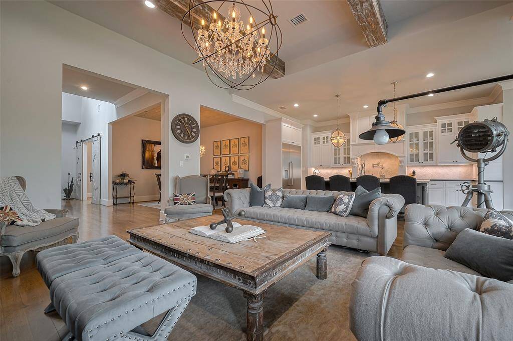 Designed with entertaining in mind, this home offers a seamless open-concept layout that effortlessly connects the main living areas. The spacious living room flows into the kitchen and dining spaces, creating an ideal setting for gatherings both large and small.