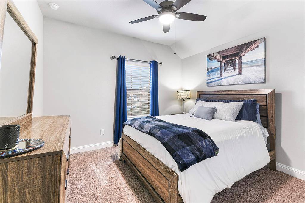 Secondary bedrooms located at front of the home, while primary is in the back of the home.  Bedrooms include spacious closest and ceiling fans.