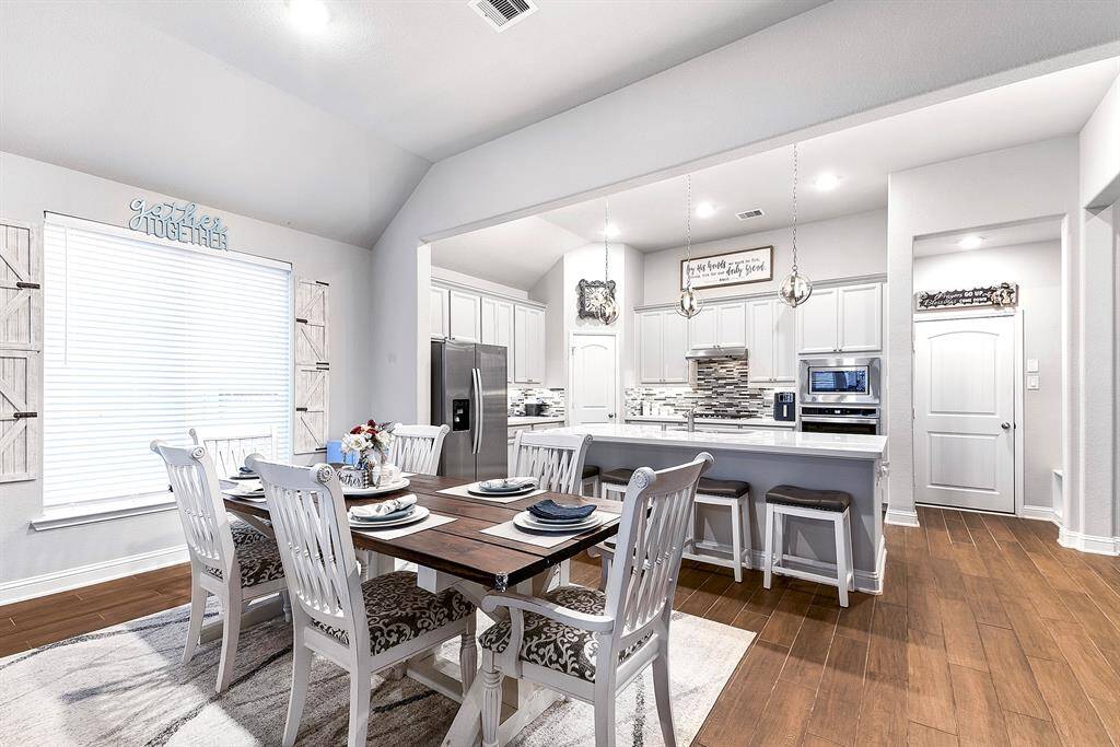 Dining space open to kitchen and family room, plenty of room for a large table.