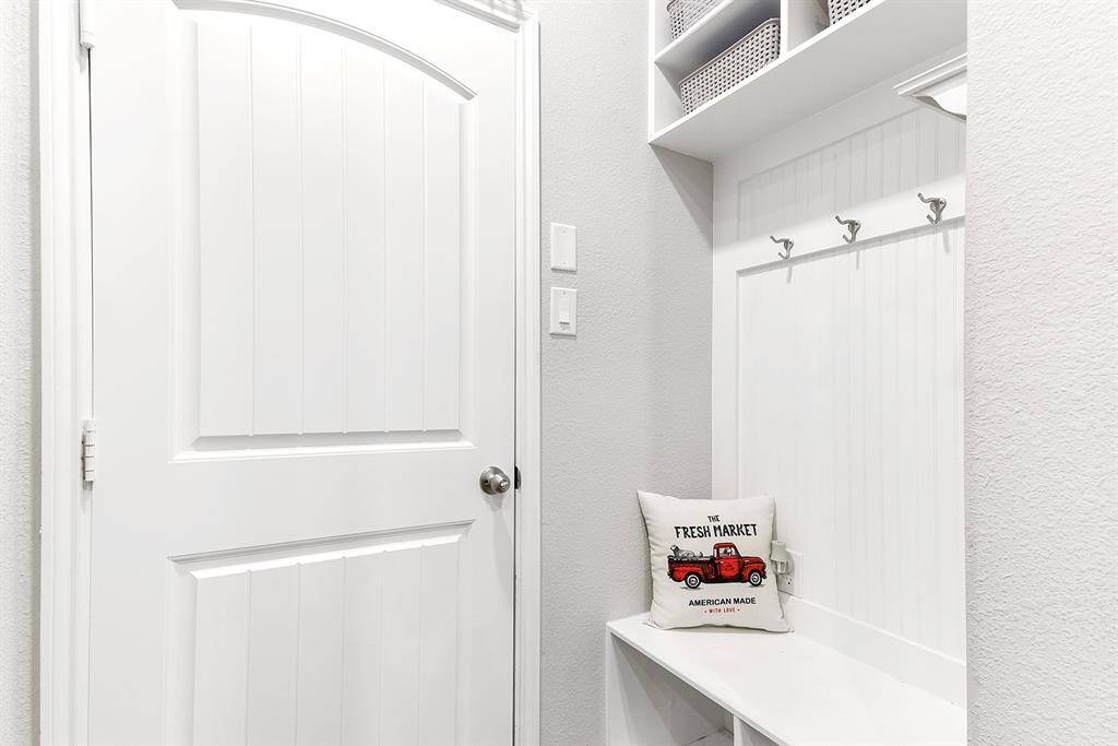 Mud area located by garage door.