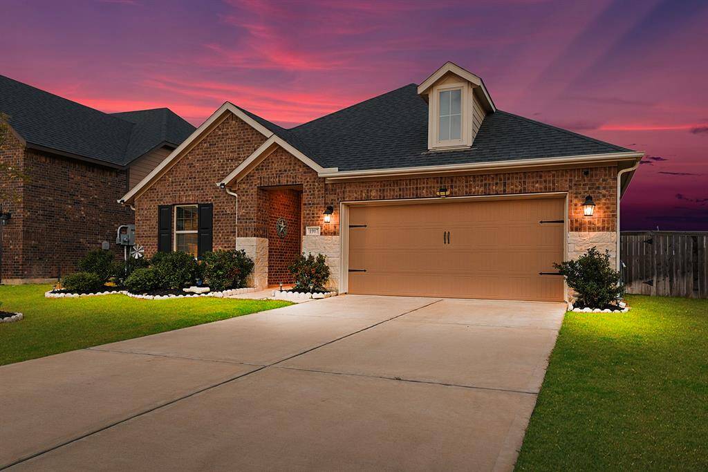 Fully bricked home with stone accents.