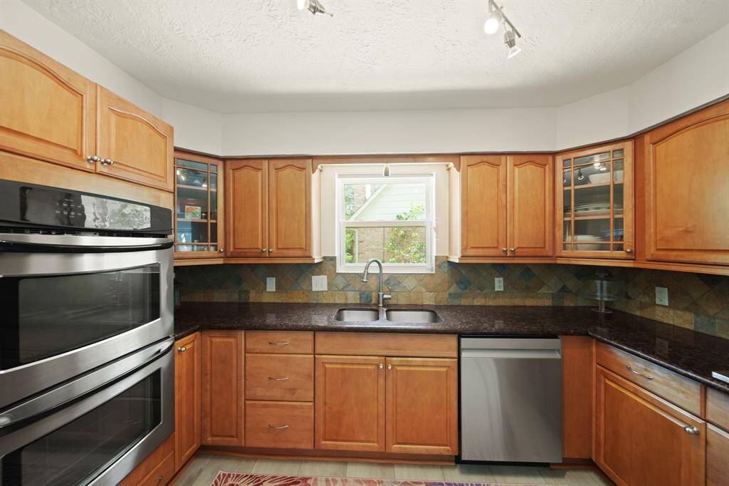 The kitchen also has stainless steel appliances.