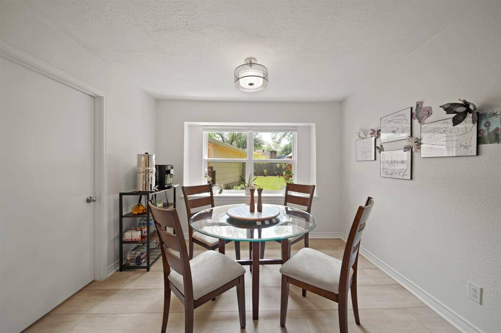 The breakfast room features awindow with views in your backyard.