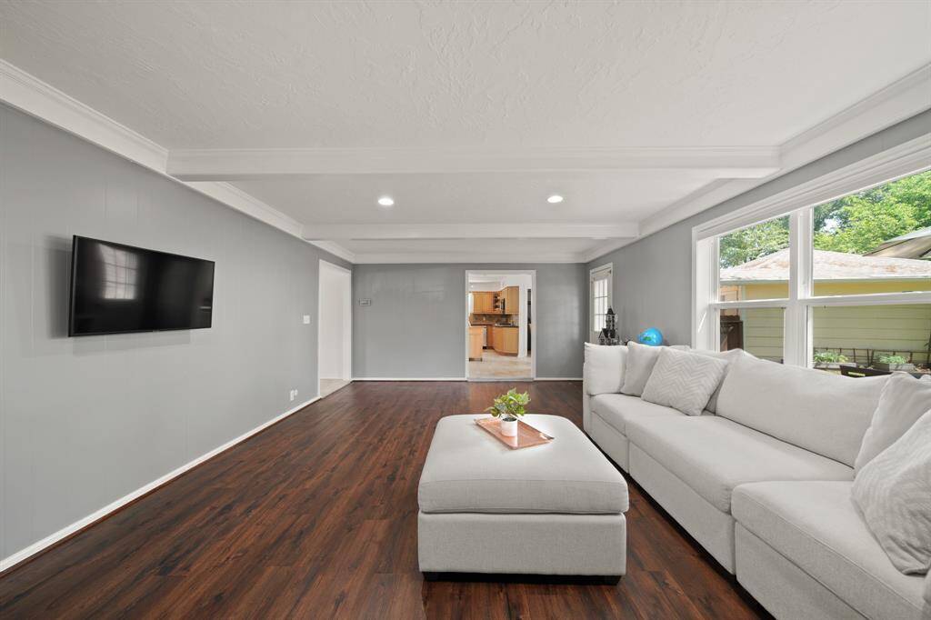 Another view of the bright andspacious living room.