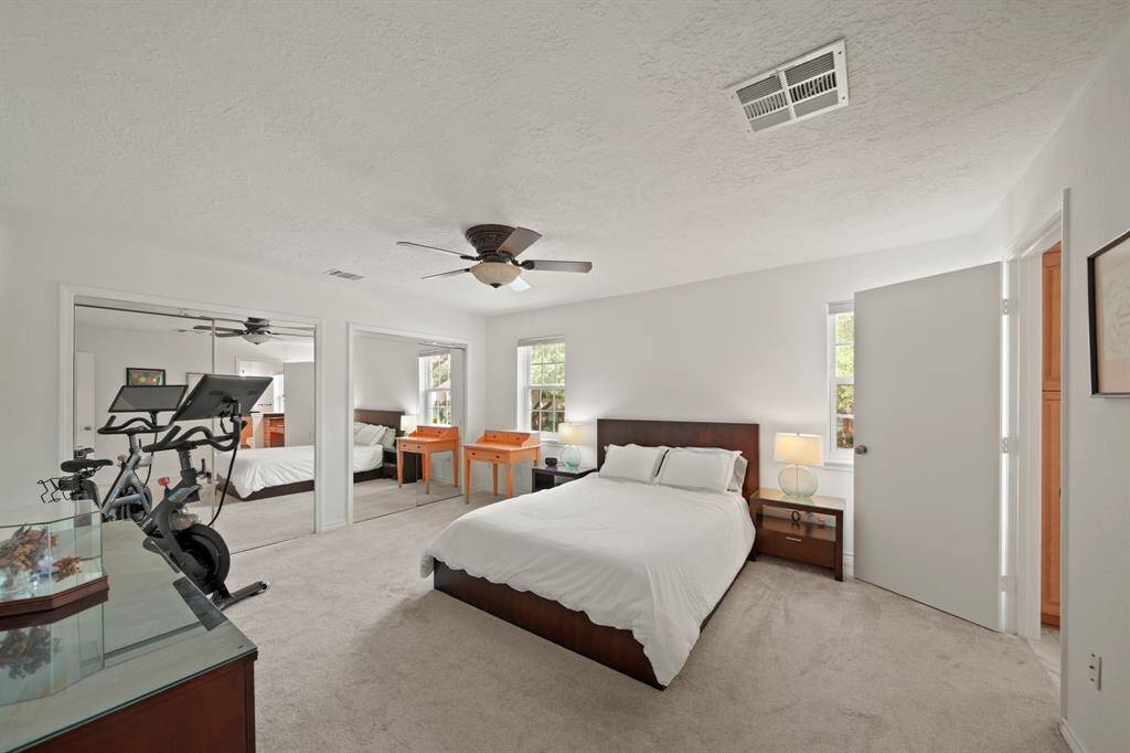 Step into the sanctuary of theprimary bedroom.