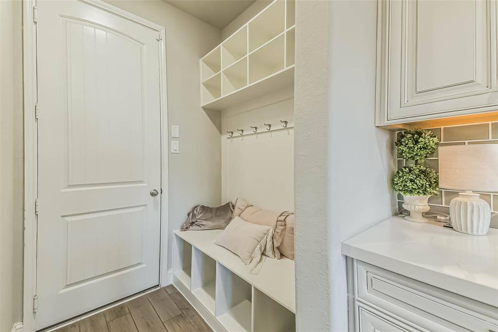 Oversized mud room and pantry are just off the 3 car tandem garage entrance.