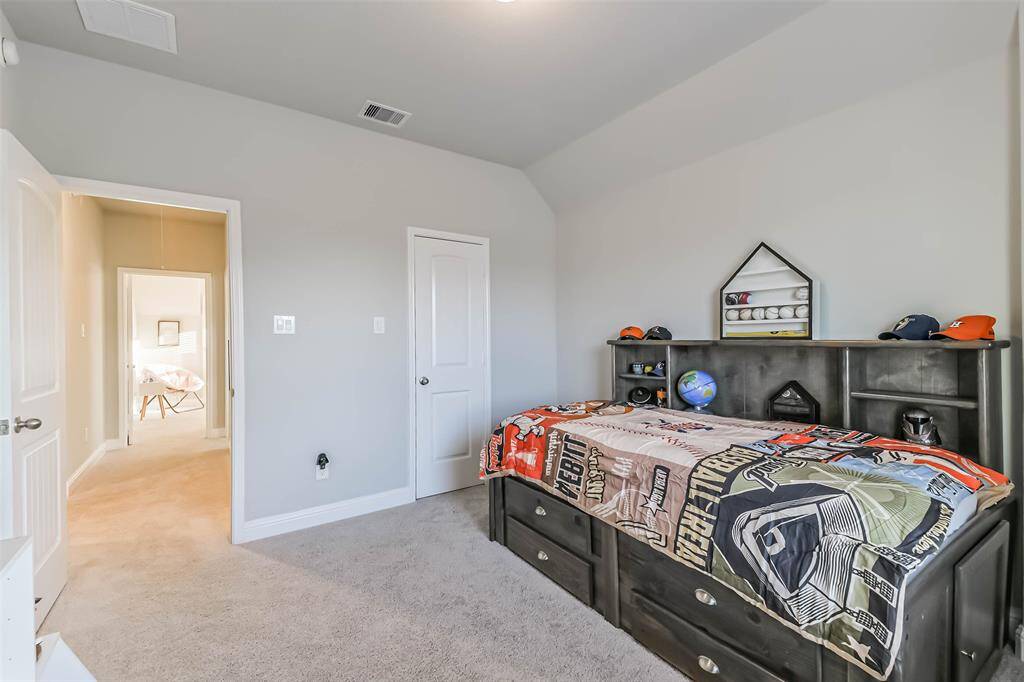 Third bedroom has walk-in closet and views of the park and lake.
