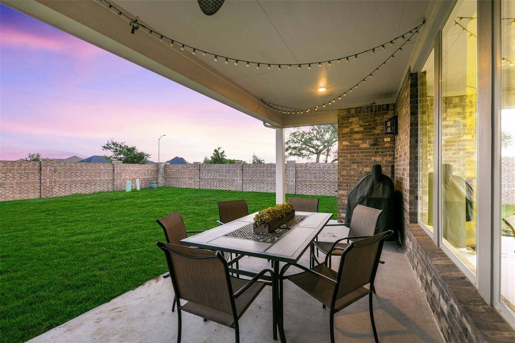 More options as the porch continues - enjoy a meal in total privacy with no back neighbors or side neighbors. This spot offers another perfect view of the Amira sunsets.