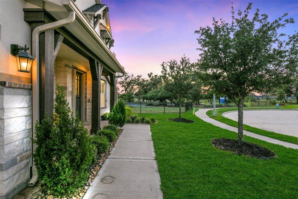 Great view of the trees and the lake beyond from this front porch.