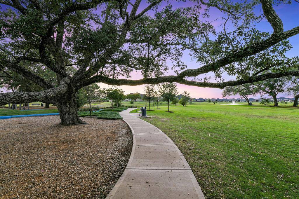 Beautiful oaks and the lake in the background and the sunset beyond - this could be your view!