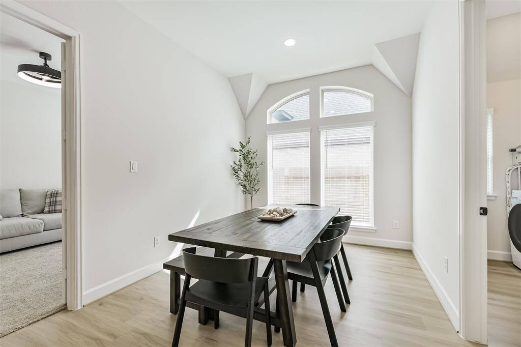 This bright breakfast room adjoins the game room - so many spaces together for all your relaxation or entertainment needs.