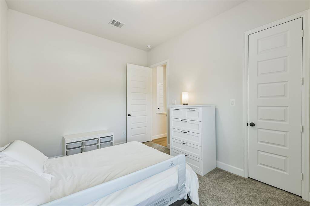 Third bedroom with walk-in closet.