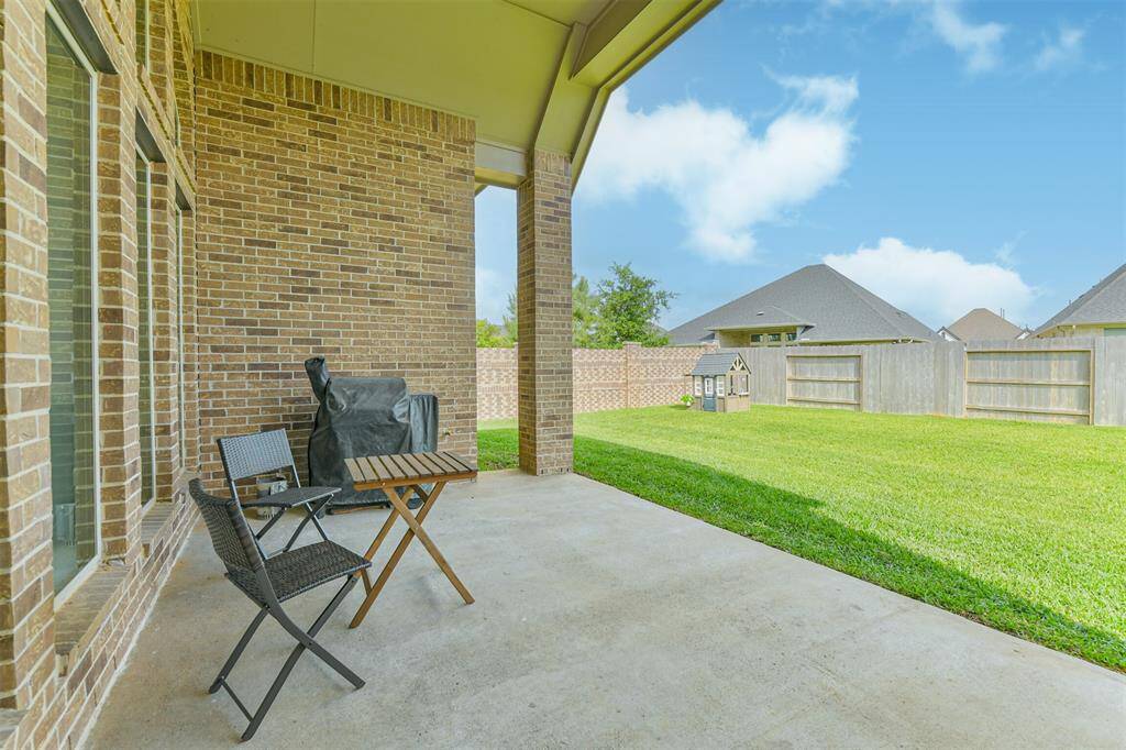 Extended covered back porch with gas stub.