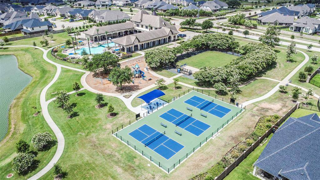 Next to the Resort are pickleball courts, a dog park, and playground, as well as the lake and walking paths.