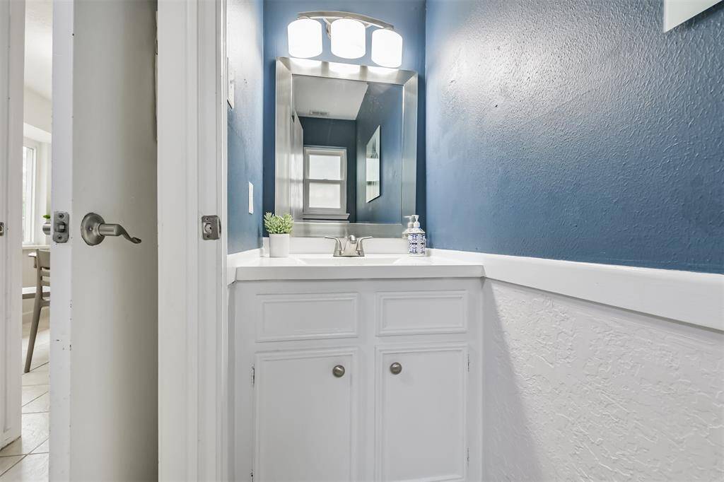 The half-bath is also found off the utility room.