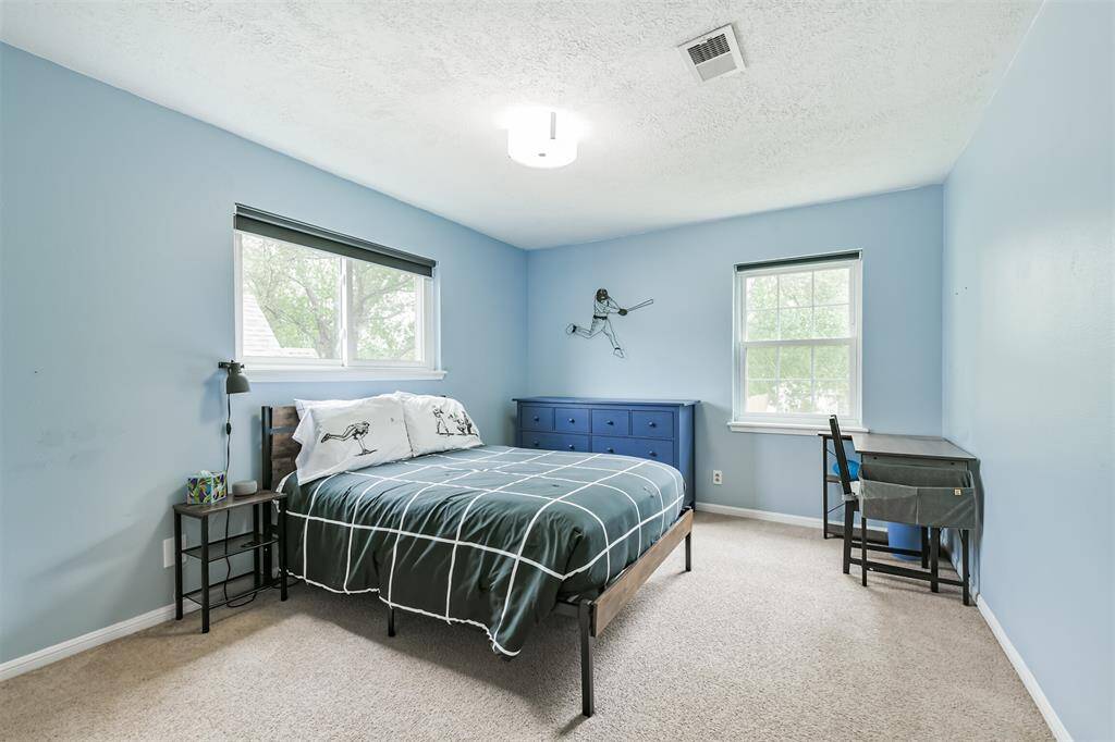 Our final bedroom stop and we find another amply sized bedroom.