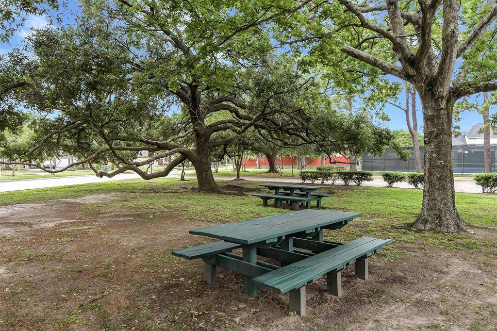 One of the community parks with baseball diamond, tennis courts, and public picnic tables.