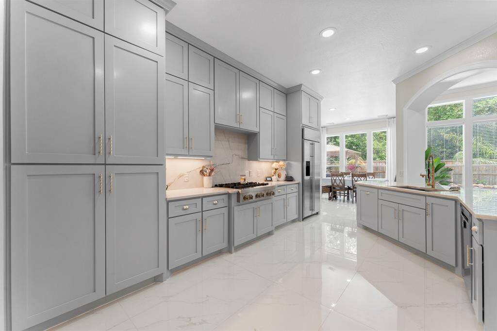 Gorgeous fully renovated kitchen with custom cabinets, all soft closing doors and cabinets.