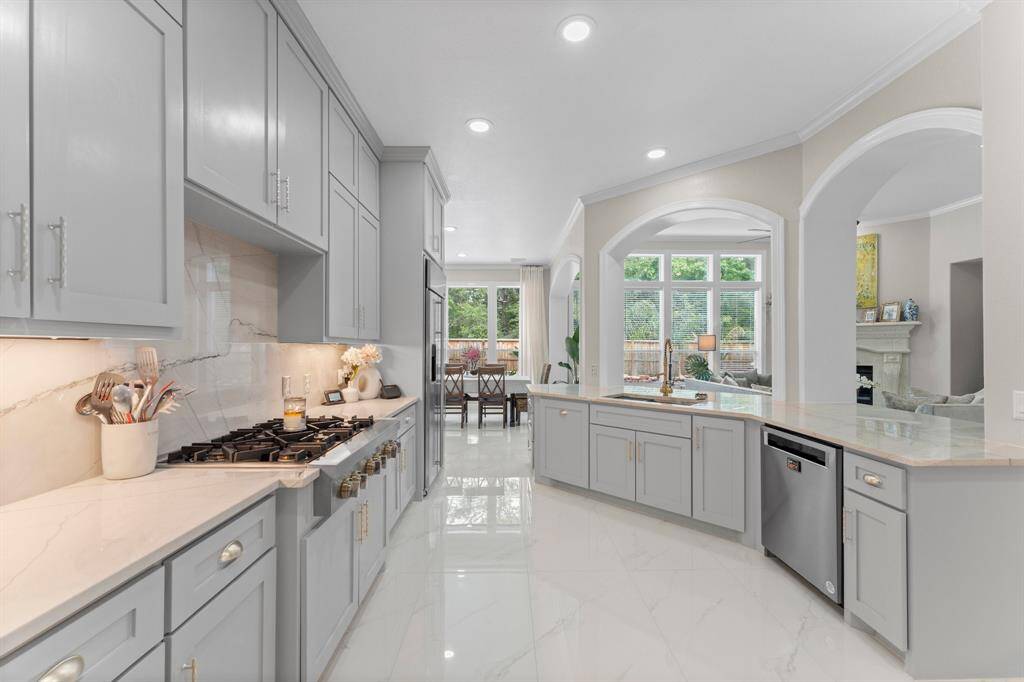Open floor concept, new appliance includes the built in refrigerator.