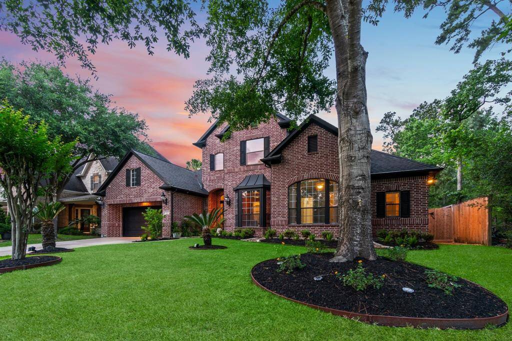 The lush and perfectly manicured landscaping makes the ideal introduction to this impeccably updated home.