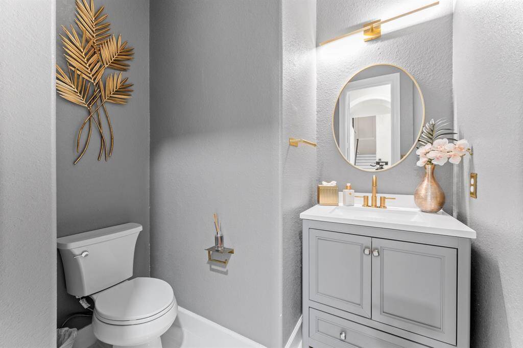Half bath is near the dining room.