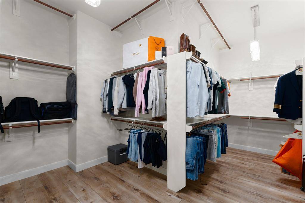 Another view of the primary closet.  Looks bigger in person!