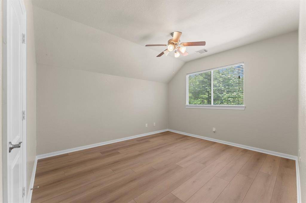 Second bedroom upstairs with large walk in closet.