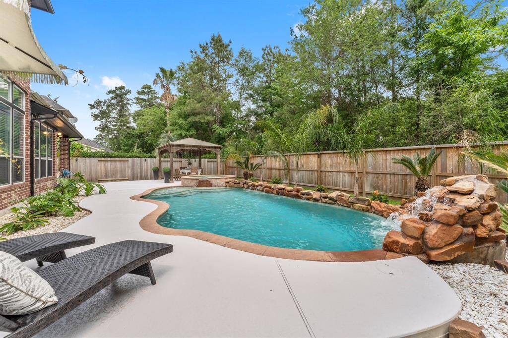 Daytime view of the backyard.  Don't miss the side yard. Enough space for a play structure.