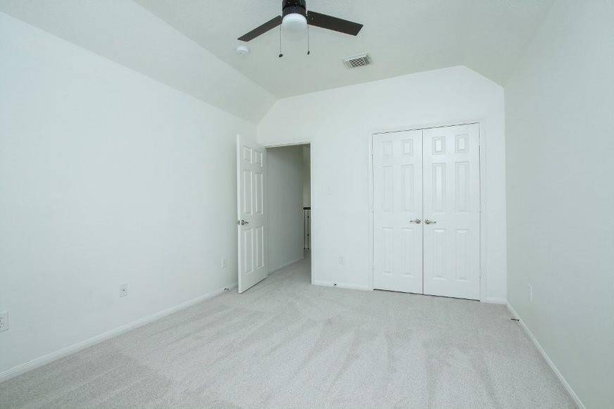 Back south bedroom overlooking pool