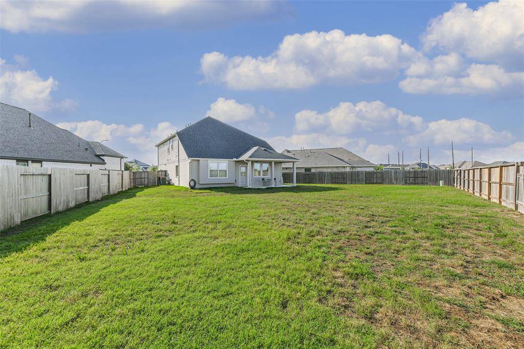 Huge backyard with no back neighbors and no street lights behind either. This yard would hold a pool plus other outdoor activities.