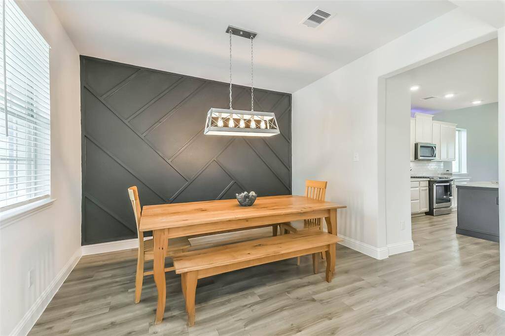 Formal dining adjacent to the kitchen.