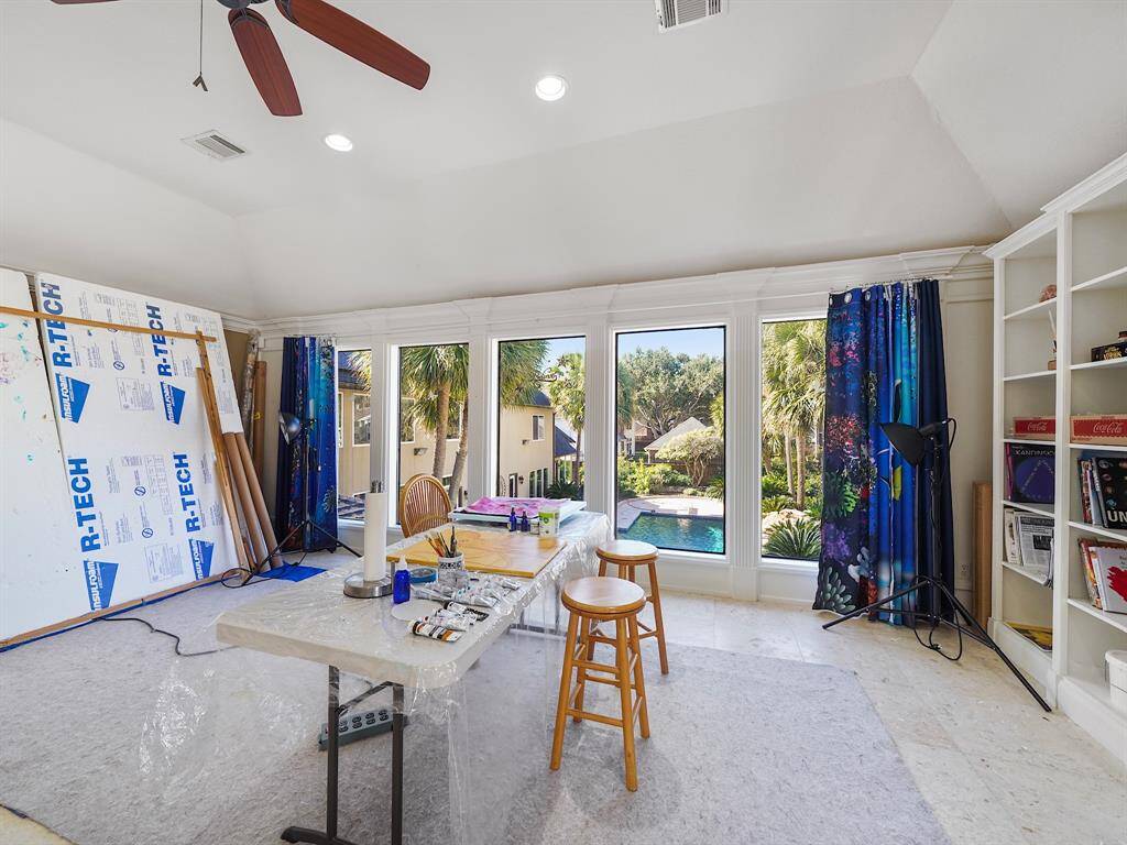 Welcome to your stunning suite, where breathtaking views of your private backyard oasis and sparkling pool await you! This beautifully designed space features expansive wall-to-wall windows that flood the room with natural light.