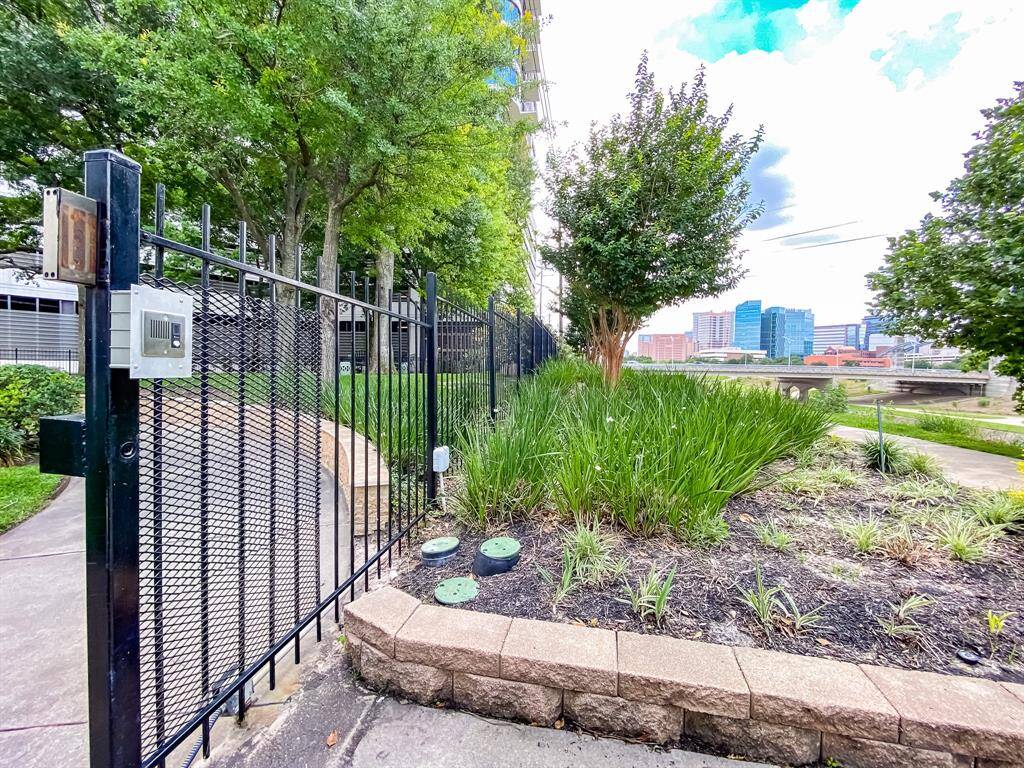 Private pedestrian gate with access to hike and bike trails
