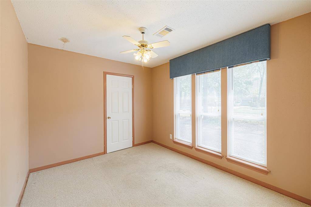 One of three secondary bedrooms.