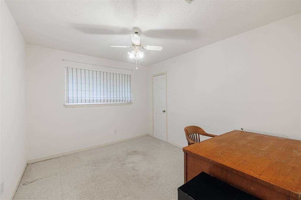 One of three secondary bedrooms.