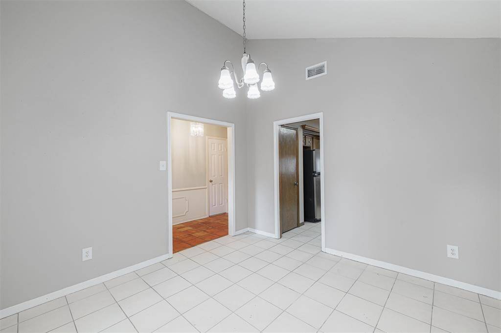 The formal dining room features views of the front yard and is connected to the kitchen making entertaining a breeze.