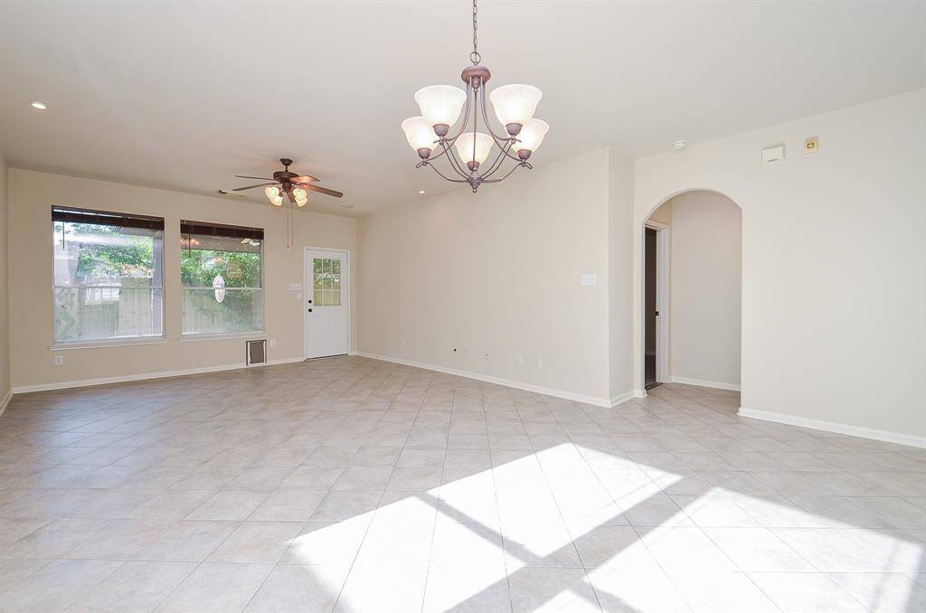 Elegant tile flooring extending seamlessly throughout the entire home