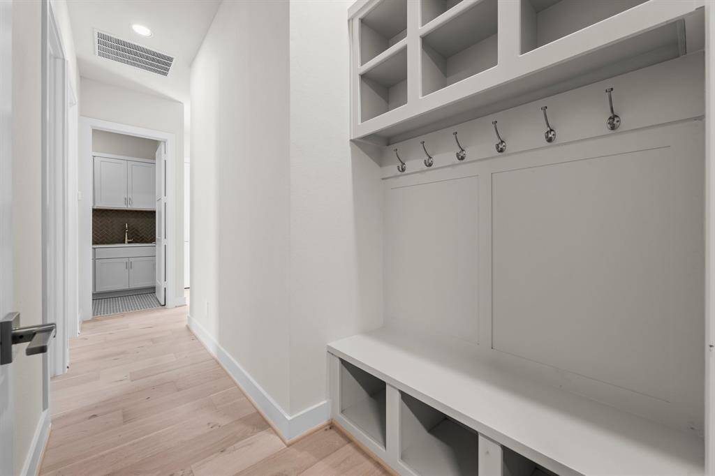 Built-in Bench with Hooks and Storage Cubbies to Keep You Organized
