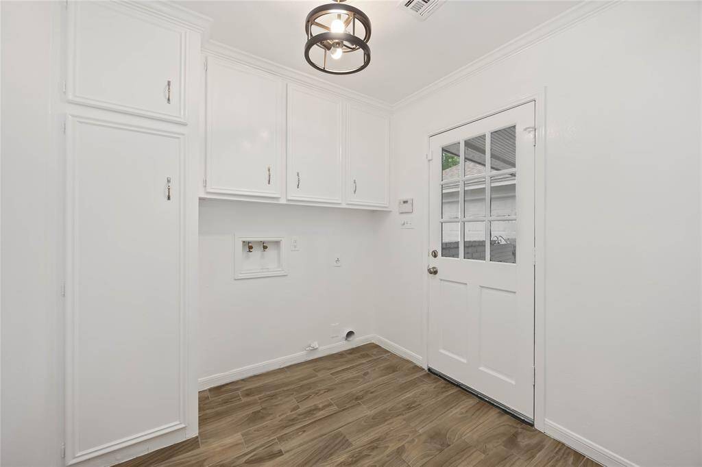 Laundry room next to the kitchen