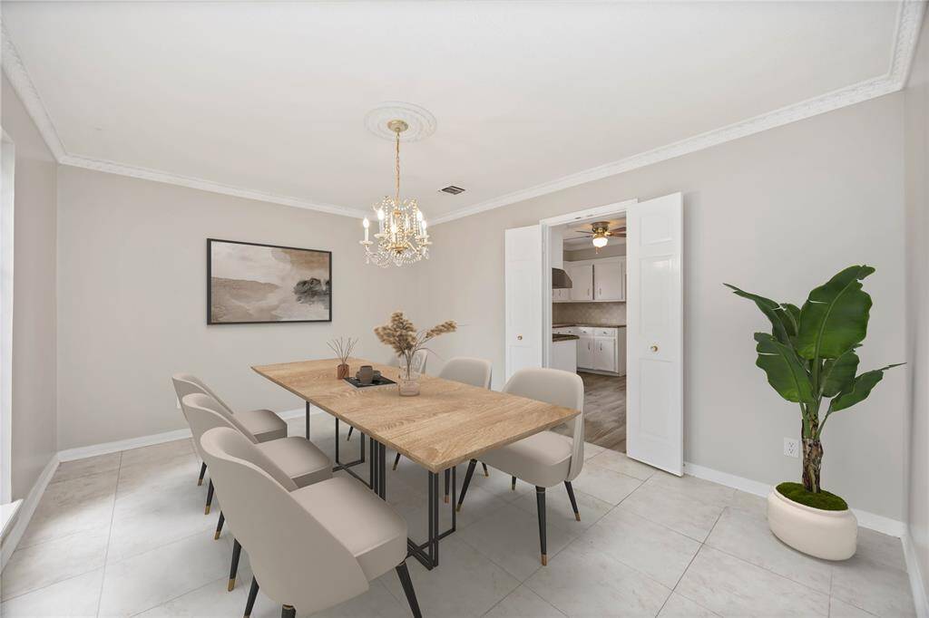 Dining room to the left when you walk into the home- Virtually staged.