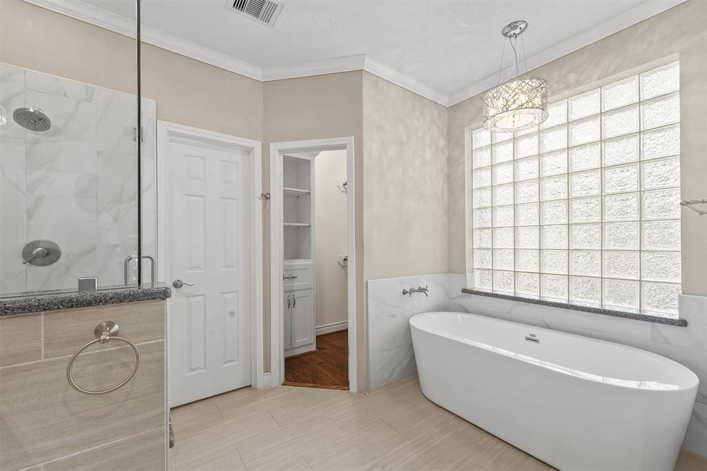 Relax in the freestanding tub!