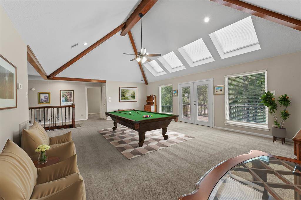 The game room has been virtually staged.