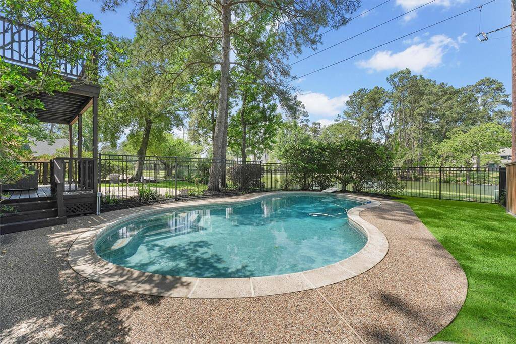 Totally fenced pool area.