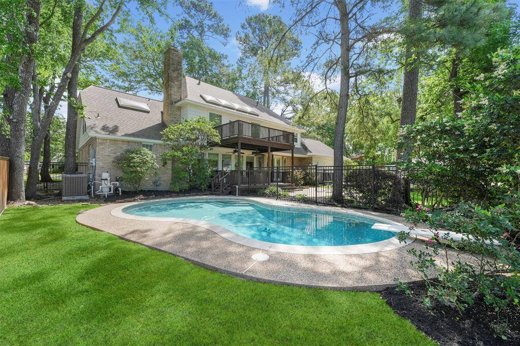 Another view of the pool and this lovely home!
