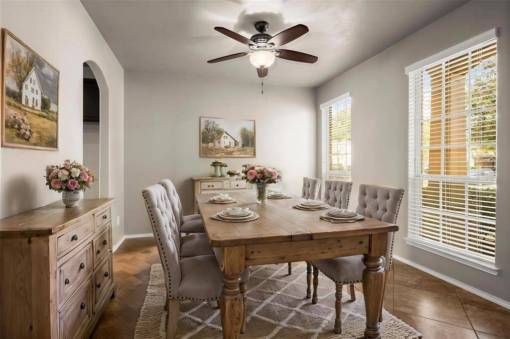 Dining room flows easily into the kitchen and creates a lovely first impression as you walk through the front door.