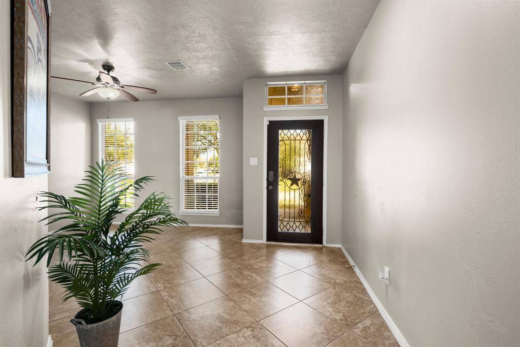 Formal foyer with the dining room to the left.