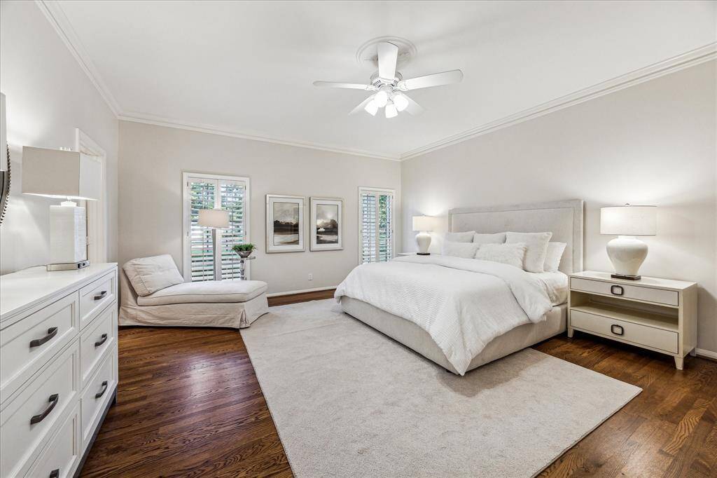 First floor Primary Suite, overlooking the lush front gardens